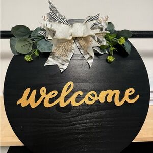 Black Welcome Sign with Gold Lettering